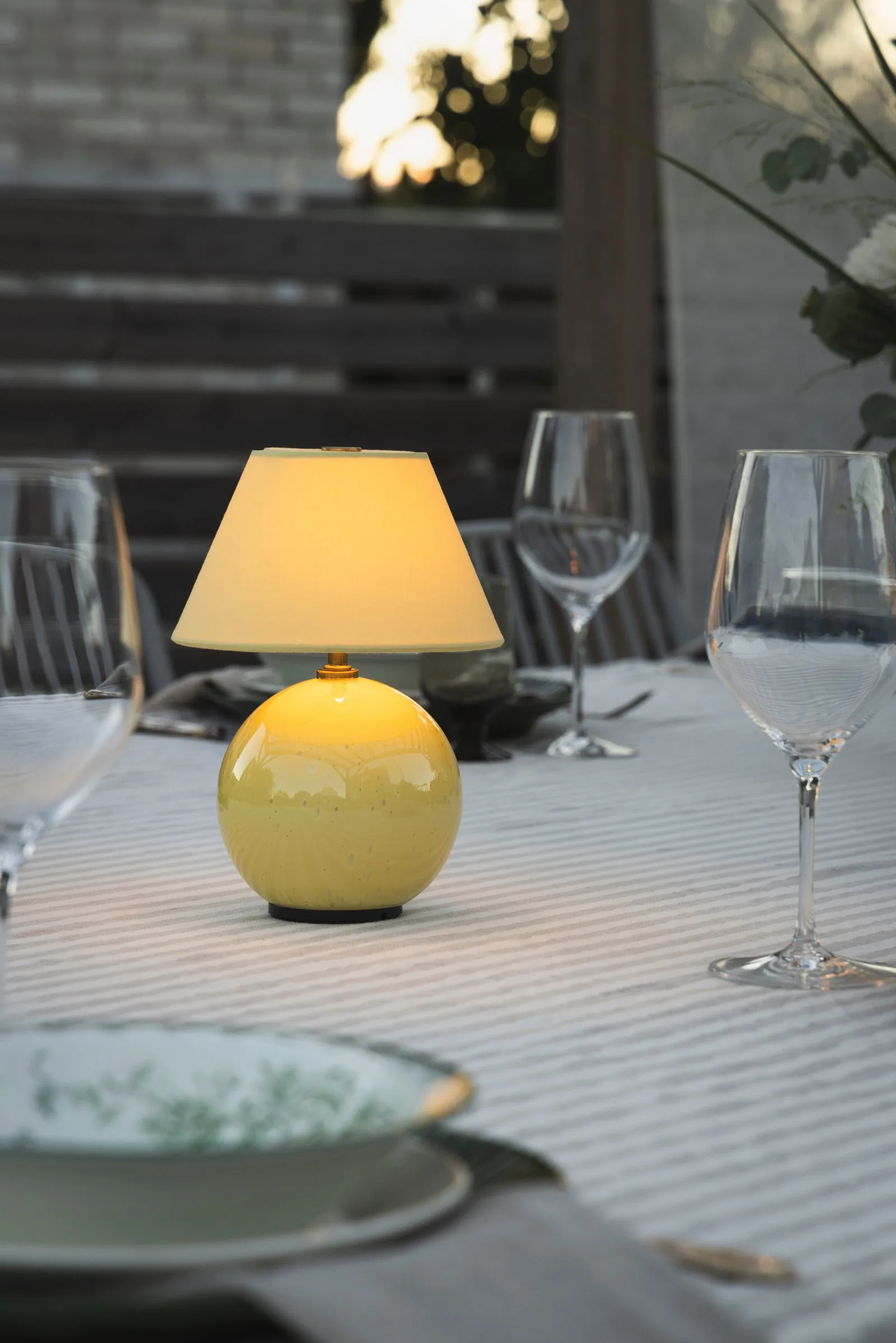 Iris 16 portable table lamp, Butter yellow Globen Lighting